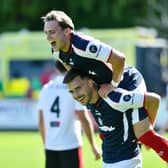 Ethan Ross celebrates with Falkirk team-mate Ross MacIver