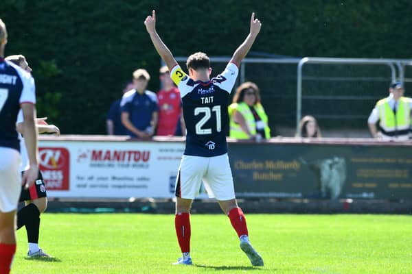 Dylan Tait celebrates scoring a hat-trick against Brechin City