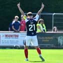 Dylan Tait celebrates scoring a hat-trick against Brechin City