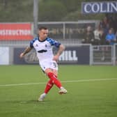 Gary Oliver slots home the winning penalty