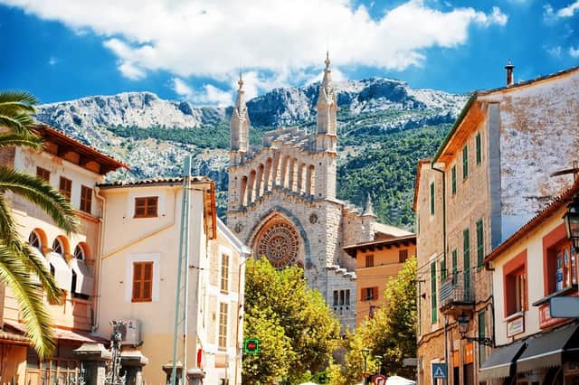 Sóller in Mallorca is known for its stunning mountain views, traditional architecture and sunny Mediterranean charm
