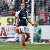 Calvin Miller celebrates scoring against The Spartans