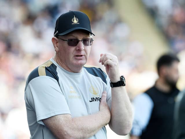 Falkirk manager John McGlynn on the touchline