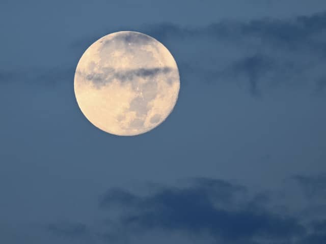 A sturgeon super moon sets in Las Vegas, Nevada, in 2023