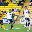 Livingston's Scott Pittman scores to make it 1-0 against Falkirk