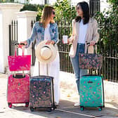 These new colourful pink, blue and green suitcases from Sara Miller London are standout luggage - and they fit within Ryanair size requirements.