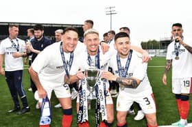 Tom Lang with team-mates Liam Henderson and Leon McCann