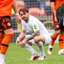 Falkirk midfielder Brad Spencer, inset Jamie Swinney