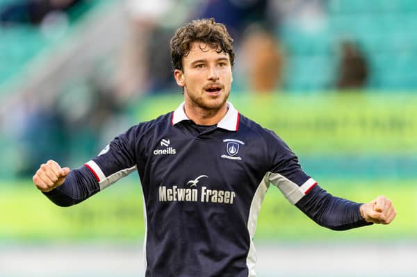 Jacob Murrell celebrates with the Falkirk fans after the 2-1 win away to Hibs