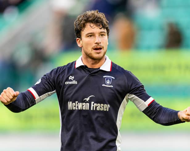 Jacob Murrell celebrates with the Falkirk fans after the 2-1 win away to Hibs