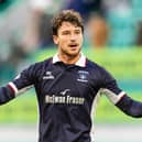 Jacob Murrell celebrates with the Falkirk fans after the 2-1 win away to Hibs