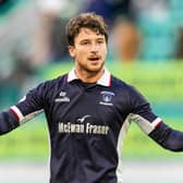 Jacob Murrell celebrates with the Falkirk fans after the 2-1 win away to Hibs