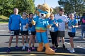 18-10-2026. Picture Michael Gillen. DENNY. Denny High School. Strathcarron Hospice 10k 2026. Ron, Strathcarron Hospice mascot.