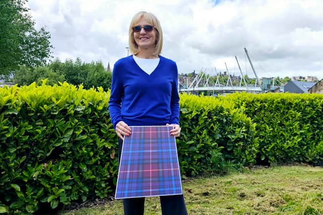 Pat models a cardboard kilt