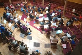 FTO members rehearsing with Musical Director, Michael Graham.