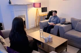 Dr Ray Cabrera, a clinical psychologist at the Purple House Clinic Falkirk, working with a client.