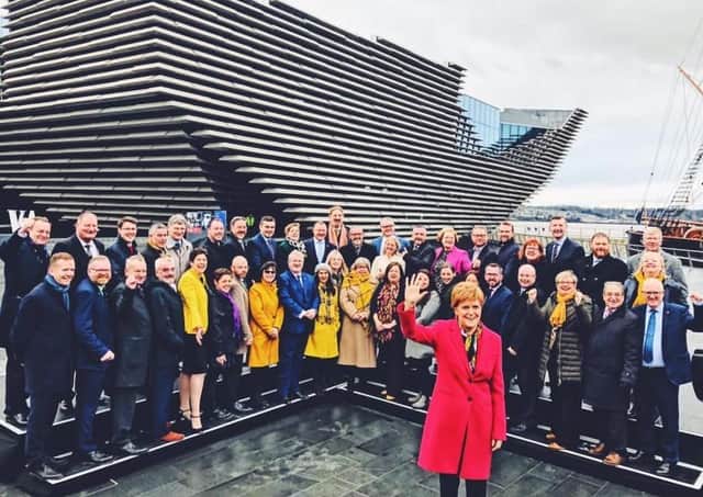 Martyn Day MP and John McNally MP (front, respectively second from left, second from right) joined the First Minister and their 45 parliamentary colleagues at the V&A Museum in Dundee.
