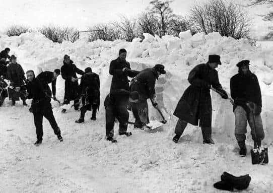 German POWs working in snow.