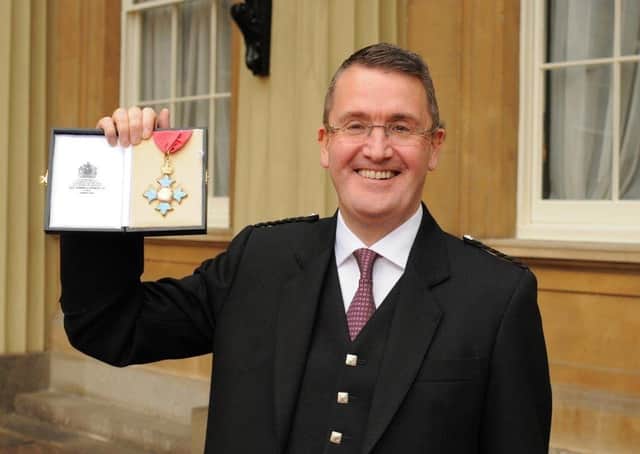 Colin Robertson, of Alexander Dennis Ltd, receives his CBE