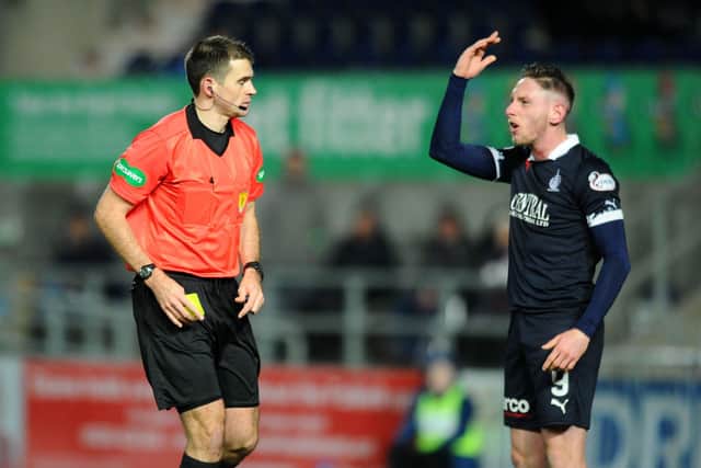 30-11-2019. Picture Michael Gillen. FALKIRK. Falkirk Stadium. Falkirk FC v Stranraer FC. Matchday 15. SPFL Ladbrokes League One. Declan McManus 9 injured on advertising hoardings and booked for walking back onto the pitch.