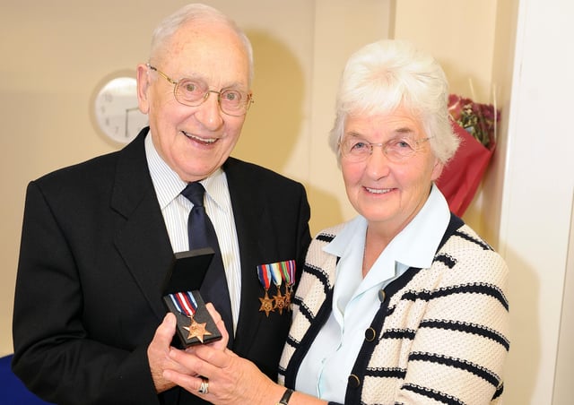 Peter Gray, pictured with wife Isabel, was awarded the Arctic Star Campaign Medal in 2013