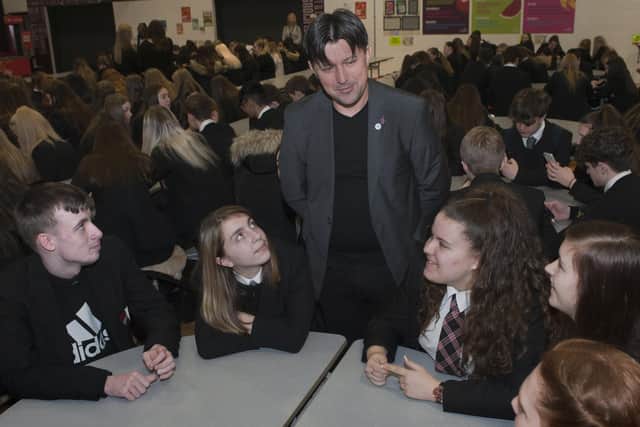 Bosnian genocide survivor Hasan Hasanovic meets pupils following his talk at Braes High School
