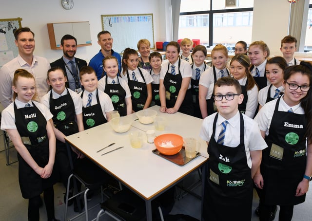 Larbert High S1 pupils with Daniel Bajwoluk, A.D.R. marketing manager; Andy Auld, depute rector; and teachers Brian Townsend and Elizabeth Kirk. Picture: Michael Gillen