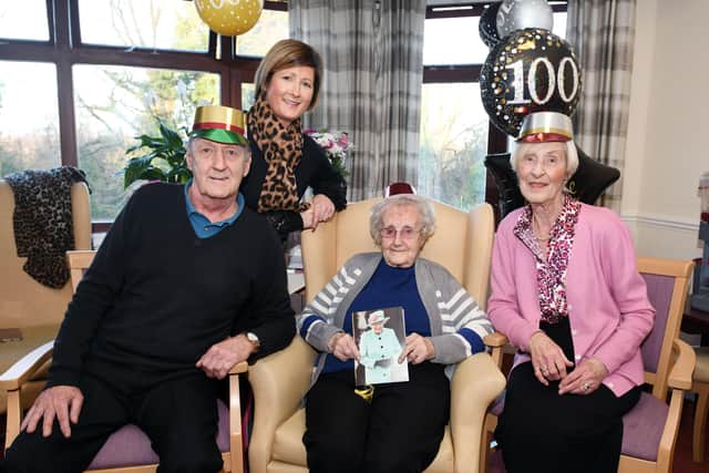 Ann Whyte marks her 100th birthday with son Alexander, daughter Janet and granddaughter Lisa.  Pic: Michael Gillen.