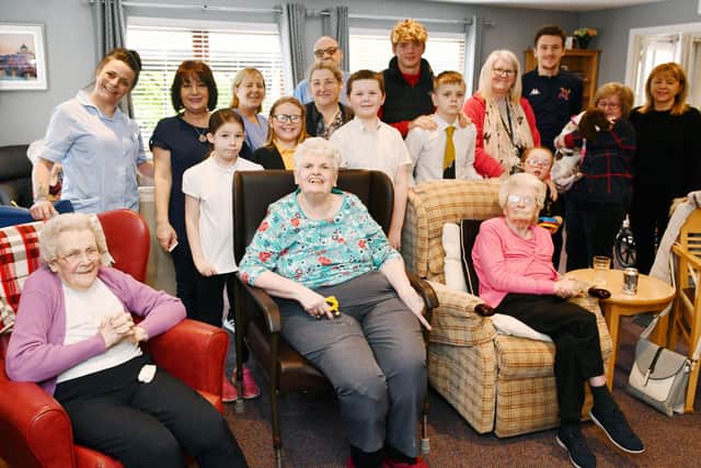Carronshore Primary pupils spend time with residents at Carrondale Care Home. Picture: Michael Gillen