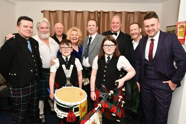 Pictured: Grant Williamson; Derek McMorrow; Dougie Smith; Jennifer Newlands Buchan; Sean Pearson; Cameron Shanks; Sammy McGivern and Richard Smith. Front; Megan Salmond and Jack Salmond, Alloa Bowmore Pipe Band both from Falkirk. Picture: Michael Gillen