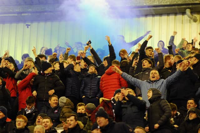 Falkirk fans celebrate the goal. Picture: Michael Gillen.