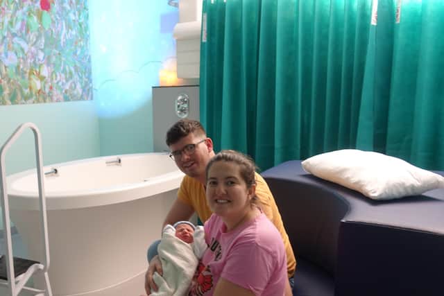 Louise Dawson and Patrik Szabo with Aron who was born in the Alongside Midwifery Unit at Forth Valley Royal Hospital.