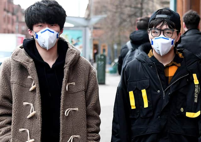 Oriental students in Glasgow are said to be snapping up surgical masks in hopes of warding off the Coronavirus - but many were wearing them even before the outbreak, as a defence against vehicle pollution on Glasgow roads