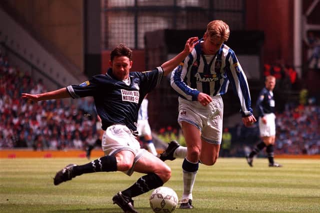 McAllister takes on Dylan Kerr of Kilmarnock at Ibrox during the Tennents Scottish Cup final 1997.