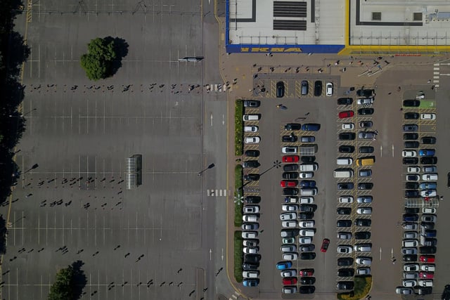 Massive lines of people could be seen snaking around the car parks at the Swedish furniture giant's branches in Wednesbury, West Mids., and Nottingham.
