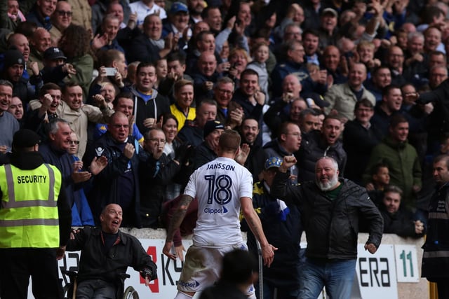 Pontus Jansson celebrate Leeds United going ahead with the travelling faithful.