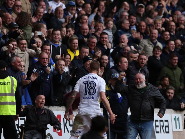 Pontus Jansson celebrate Leeds United going ahead with the travelling faithful.