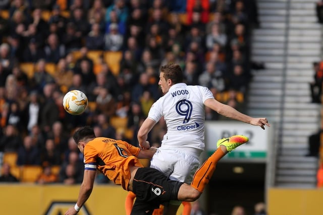 Striker Chris Wood rises high.