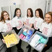 S5 pupils Tilly O'Donnell, Meredith Rae, Elle-Rose Fotheringham and Abby Reid set up Lady Business at the school, supported by Hummanities teacher Lindsay Howie.  Pic: Michael Gillen.