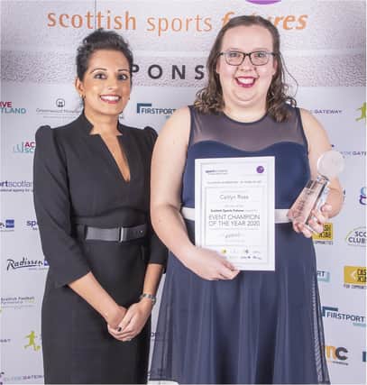 Caitlyn received her award at the plush ceremony in Glasgow from Hinna Rubbani Mills.  Image: sportScotland/Margaretann McKenna and Megan Sharpe
