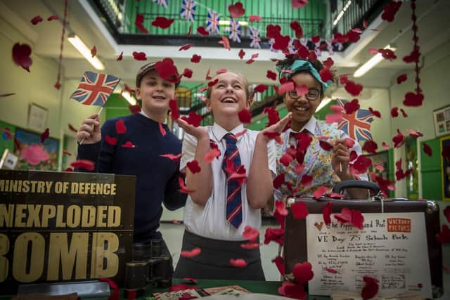 Serious message...but that didn't mean pupils weren't able to have fun too with some poppy petals, which veterans now have a stack of at home to make supplies for Remembrance Day.  (Pic: Mark Owens/Poppyscotland).