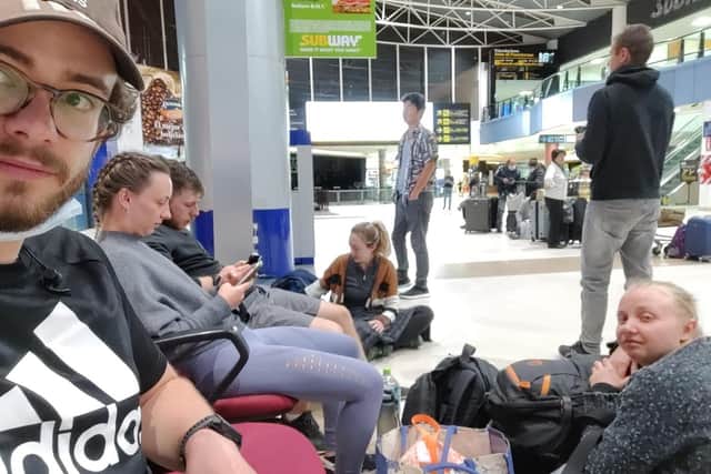 Kenneth, left, pictured in the airport at Bolivia awaiting a flight to Chile.