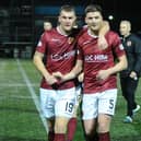 Stenny captain Andy Munro (left) with team mate David Marsh after a match earlier in the season.