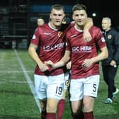Stenny captain Andy Munro (left) with team mate David Marsh after a match earlier in the season.