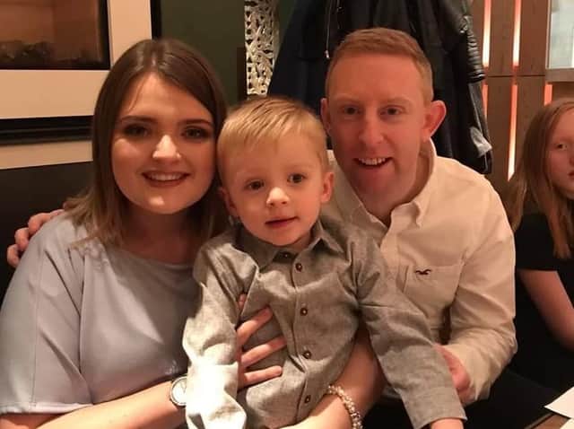 Laura Newman and her husband Chris with their three-year-old son Harry