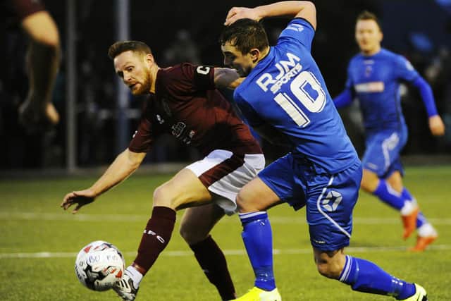 Bo'ness (in blue shirts) in action against local rivals Linlithgow Rose earlier this season