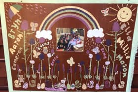 This garden mural features many of the images the children and their friends have been displaying in their windows.