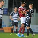 Barr, during his time with The Shire, exchanges words with former Falkirk striker Nathan Austin during a Lowland League match with Kelty Hearts