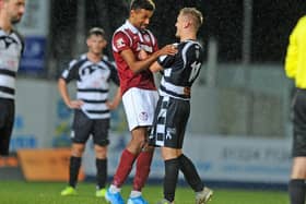 Barr, during his time with The Shire, exchanges words with former Falkirk striker Nathan Austin during a Lowland League match with Kelty Hearts