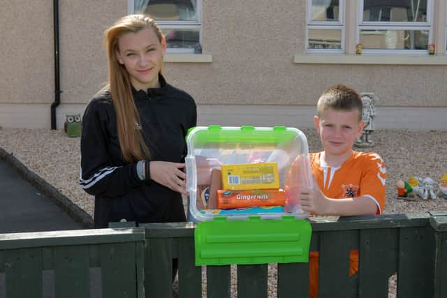 Jayden Fulton  and Tiegan Riddoch who collected for the NHS and Police